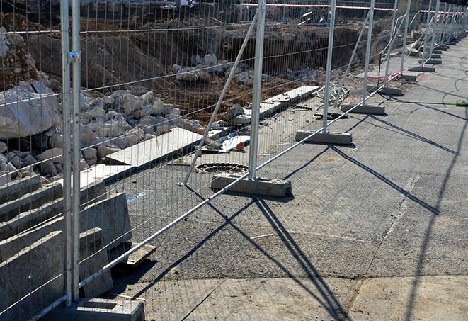 a temporary fence panel gate, allowing controlled access to a designated area